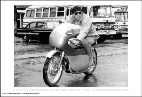 Steve McQueen on the set of The Sand Pebbles on race bike